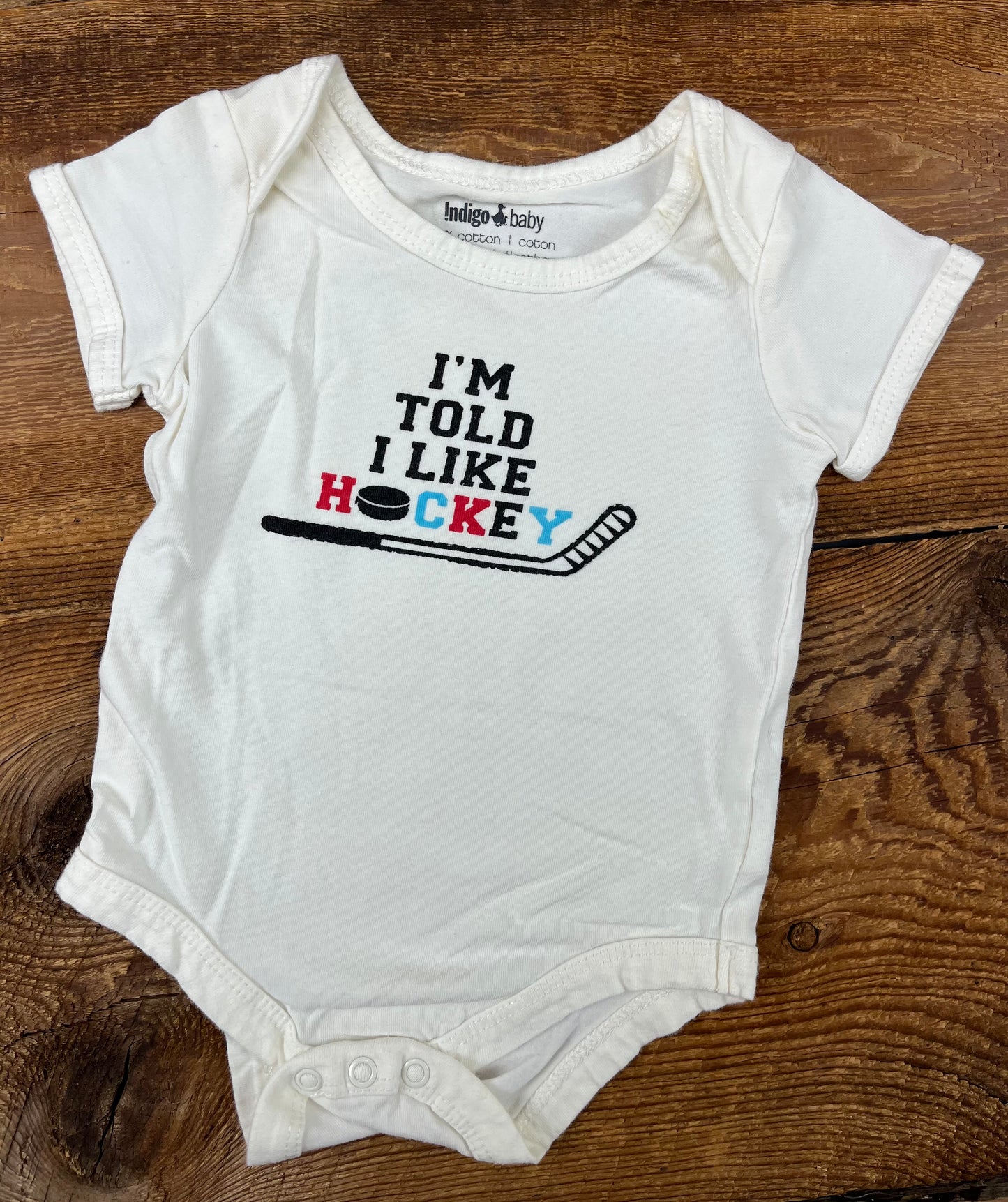 Indigo Baby 3-6M Told I like Hockey Onesie