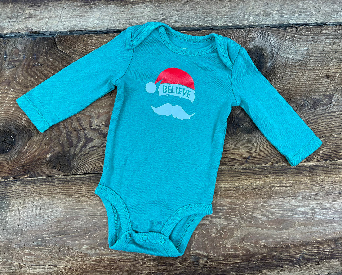 Carter’s 3M Believe Onesie
