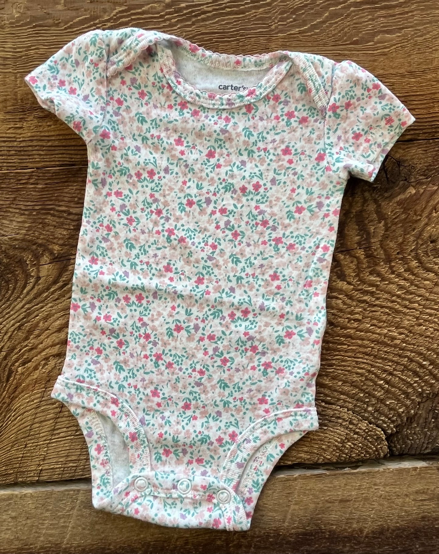 Carter’s NB Floral Onesie